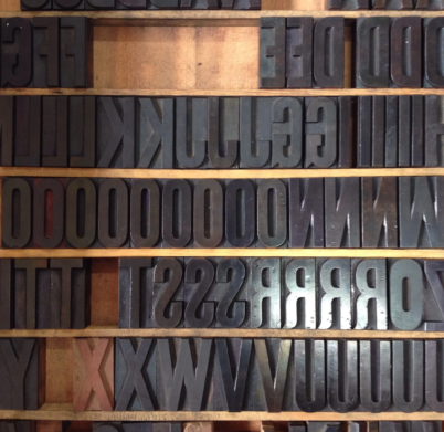 wooden-alphabets-arranged-shelves